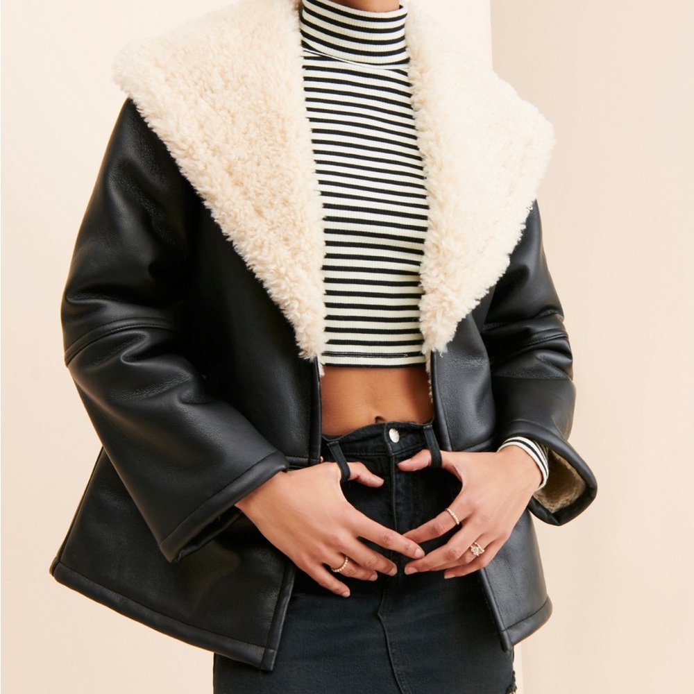 Free people leather jacket with fur.